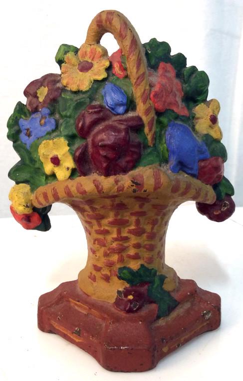 Vintage colorful iron floral Doorstop: Colorful floral Doorstop. Approximately 6 inches tall. Paint is worn. Doorstop, floral, floral doorstops, doorstops, vintage Doorstop, collectible, decor, decorative, floral design, vintage decor, iro