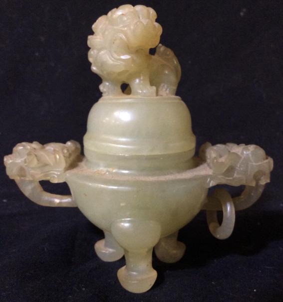 Jade / Jadeite Foo Dog Censur: Natural stone, pale green tone possibly jade or jadeite Foo Dog Figural On Lid, Footed Design, one Ring missing from Handle. Measures approx 4 in by 5 in by 2 1/2 in. Vintage collectible, asian arts a