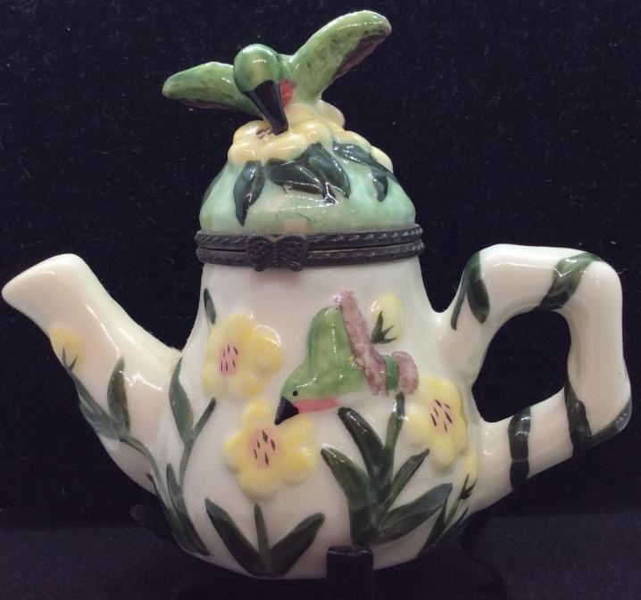 Vintage porcelain Teapot Pill Box: Porcelain pill box in form of teapot with floral design and hummingbird Figural on lid, measures approx 4 in by 4 1/2 in by 2 in, Pill Box, Trinket Dish, vintage collectible, vanity accessory. Shelf p