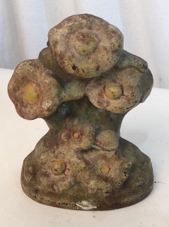 Vintage iron floral doorstop: Vintage iron door stop in the shape of flowers. Paint is very worn. Measures approximately 6 inches tall. Iron, vintage iron, vintage, vintage item, vintage collectible, collectibles, collectible, col