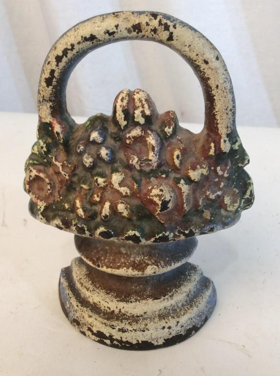 Vintage iron flower basket doorstop: Vintage doorstop in the shape of a flower basket containing flowers. Paint is worn and is approximately 6.5 inches tall. Iron, vintage doorstop, vintage decor, collectible, home decor, flower, flower 