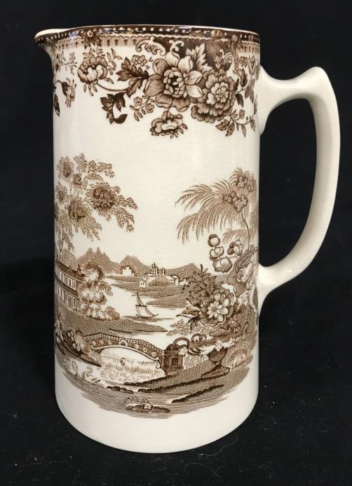 Royal Staffordshire Clarice Cliff Tonquin Pitcher: English Royal Staffordshire Clarice Cliff Tonquin Pitcher, marked on underside Tonquin Royal Staffordshire Dinnerware by Clarice Cliff Made In England. Measures approx 7 inches tall x 5.5 inches wide,