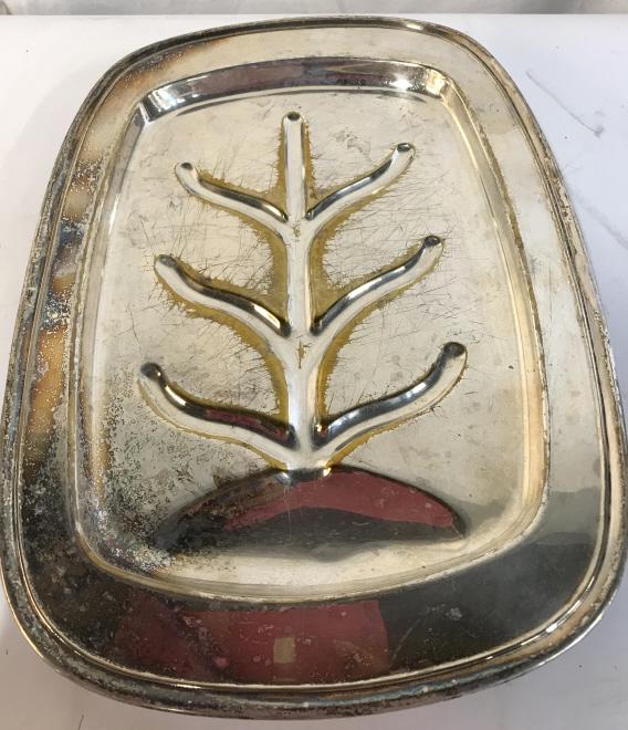 Silver toned serving platter: Serving platter in silver tone, Visible wear. Tray is elevated on feet. Measures approximately 16 by 12 inches. Underside reads VBC NS. serving platter, serving, serveware, silver tone, serving tray,