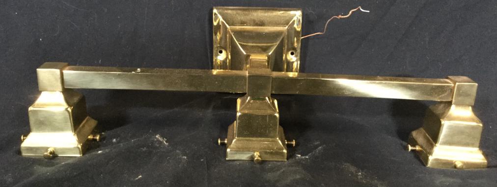 Gold Toned Metal Light Fixture: Light fixture is gold toned and metal. Piece contains 3 bulb sockets. Piece measures approx 20 inches long 5 inches tall. home lighting and accessories, home decor, 6