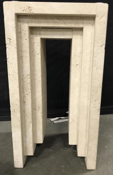 MARBLE ART DECO STYLE Pedestal: Fully carved marble piece from Several slates and mortared into an Art Deco style piece. Marble is cream colored with natural stone air pockets. Possibly travertine marble due to neutral tone and air