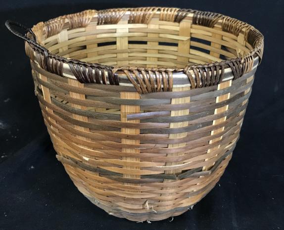 Woven basket: Woven basket with single handle measures approximately 7 inches tall and 8.5 inches in diameter. Some weaving may be loose or missing. Woven basket, basket, decor, decorative item, home, home decor, i