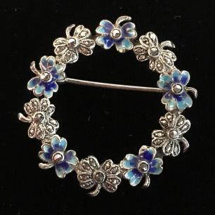German Marcasite Enamel And Silver Wreath Brooch: German Marcasite Enamel And Silver Toned Metal Wreath Brooch in floral design alternating between blue toned enameled and silver toned flowers, marked on underside Germany Silver, possibly sterling, c
