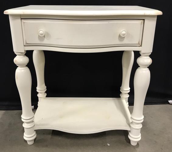 Cream Toned Sid Side Table: Cream Toned Sid Side Table With, turned legs, drawer and lower shelf, marks and scratches to piece, measures approximately 30 inches tall x 28.25 inches wide x 18 inches deep. Side Table, Hallway Tabl