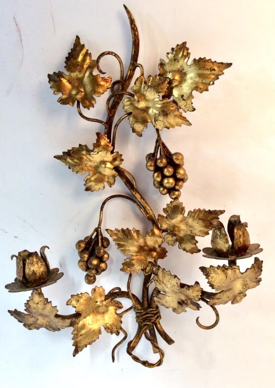Pair Gilt Metal Leaf & Berry Candle Wall Sconces: Pair of gilt metal, possibly bronze ormolu, double arm candelabra Wall Sconces stylized as grapevines. Each measures approx 15 inches in height by 9 inches in width by 5.5 inches in depth. Gilt metal 