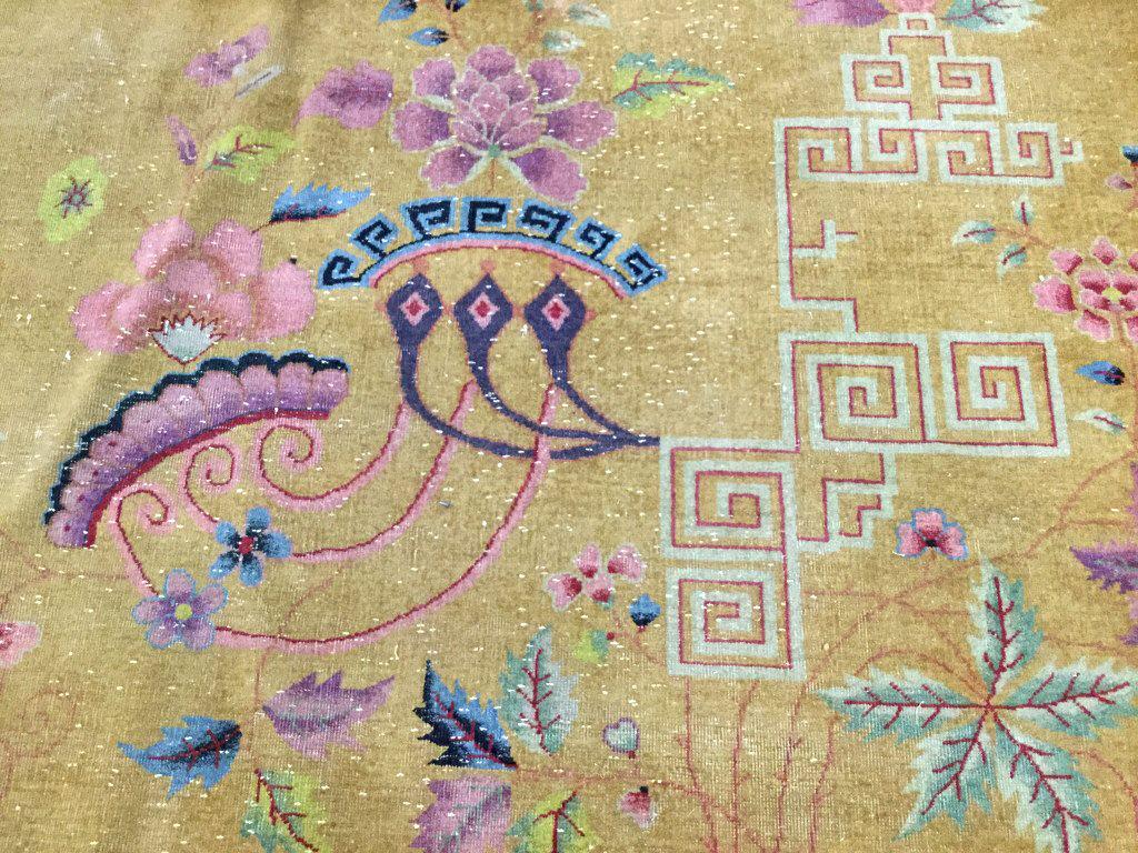 Vintage Handmade Chinese Art Deco Wool Rug: Rug is wool and handmade. Piece is vintage possibly antique. Piece contains tones of pink, red, gold, green, slate blue. Contains evident wear & color fading. Piece measures approx 140 inches long 108