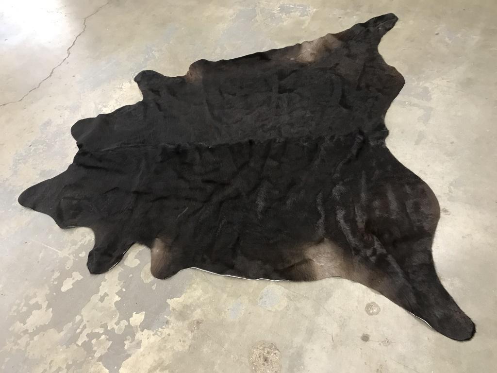 Dark Brindle Cowhide Rug: Dark Brindle Cowhide Rug Made In Brazil, marked on underside Cowhide Collection Rug-CH03 Dark Brindle Cowhide Linon Home Decor Products, light surface dirt to underside approximately 91 inches long x
