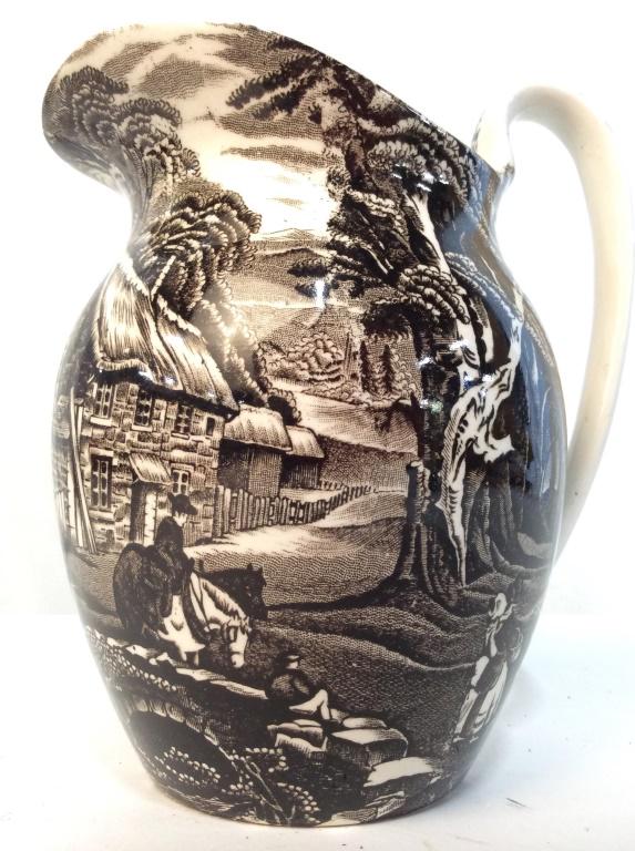 JAMES KENT Richly Engraved Earthenware Pitcher: Marked on underside for James Kent, reads ‘Genuine Hand Engraving, ‘Old Foley’ James Kent, Straffordshire, England.’ Engraving depicts figures and horses in country town. Measures approx 7.25 