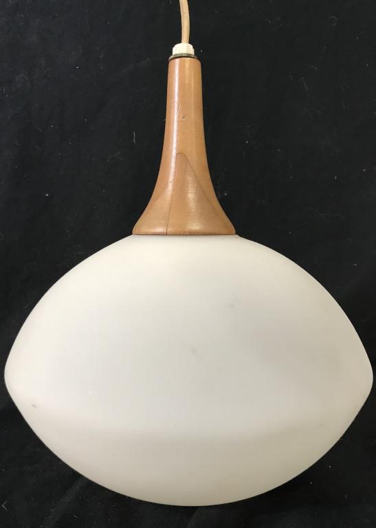 Mid-Century Pendant Wall Sconce in style of Rispal: Mid-century wood and frosted glass hanging pendant wall sconces in the style of Rispal. Lamp has not been tested. Lamp shade measures 11.5 inches in height by 10 inches in diameter. Hanging from arm, 