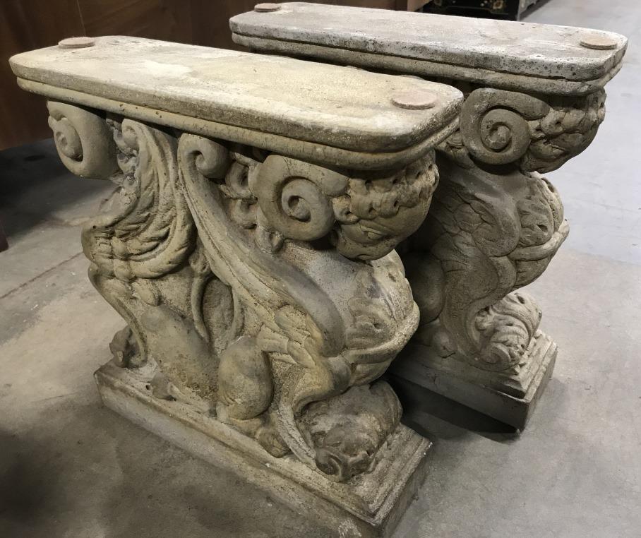 Coffee Table Griffin-Form Cast Stone Bases: Thick beveled glass top coffee table with two griffin-form cast stone, concrete bases. Stone bases are possibly antique. Have soft texture, possibly other stone-style material. Each base measures appr