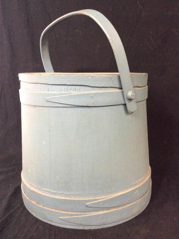 19th Century Blue Painted firkin: 19th Century firkin with Top in all original condition and blue paint. Constructed from wood. Handle is collapsible. Discoloration on inside. Measures approximately 14 inches tall. Firkin, Wood firkin