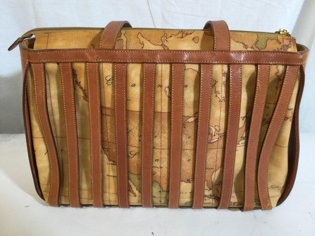 Alviero MARTINI Geo Map Shoulderbag, Italy: Luxury Italian Designer Alviero Martini Italian Leather On Leather Shoulderbag. Pre owned. Characterized by a world map motif. Footed Bottom with flat gold toned studs. Some scuff marks on underside f