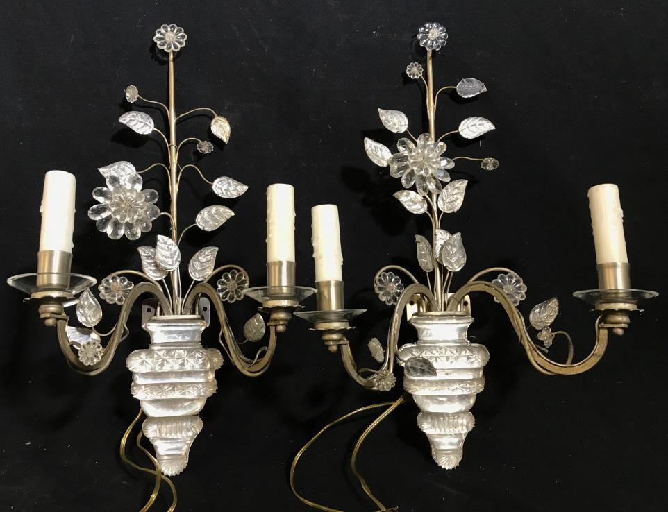 Pair Antique BAGATELLE Style Crystal Wall Sconces: Pair of antique French rock crystal double arm wall sconces in the form of flowers in vase. Possibly antique BAGATELLE. Each measures approx 20 inches in height by 13 inches in width by 6.5 inches in 