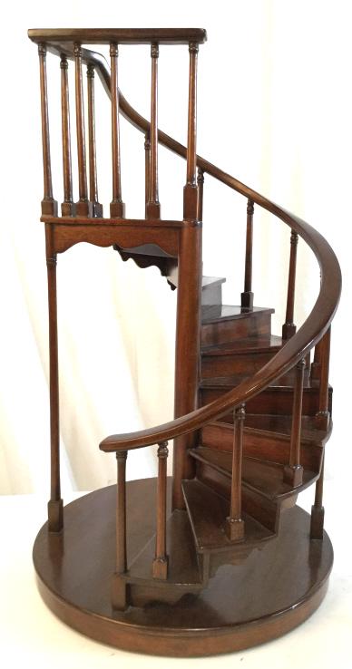 Mahogany Toned Spiral Staircas Architectural Model: Mahogany Toned Spiral Staicase Architectural Model, no condition issues noted, measures approximately 24 inches tall x 14 inches in diameter. Miniature staircases were produced by architects and furni