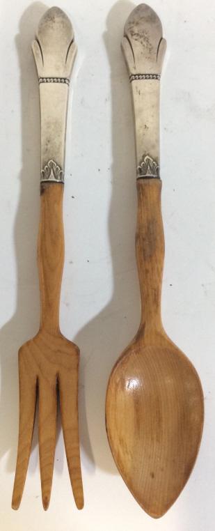 Lot 2 Wooden Salad Servers W Sterling Handles: Handles of salad serving utensils read STERLING. Pieces are wooden with sterling silver handles. Each piece measures approx 11 inches long 2 inches wide. flatware, decorative accessories, serving uten