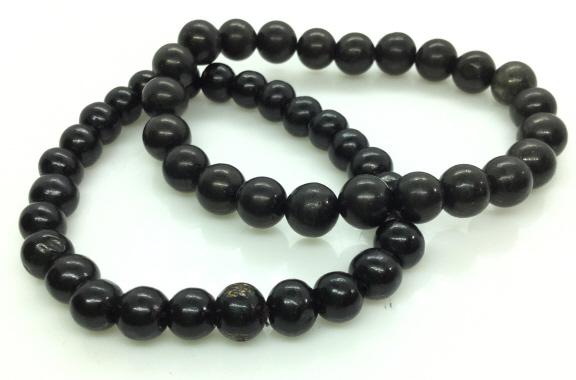 Pair Black Beaded Stretch Bracelets: Bracelet is made of natural Stone, app 5 mm round. Diameter 2 in. Stretches to app 4 in. Second bracelet matches but is not made of natural Stone. Has a 5 in stretch. Natural Stone Beaded Bracelet, Bl