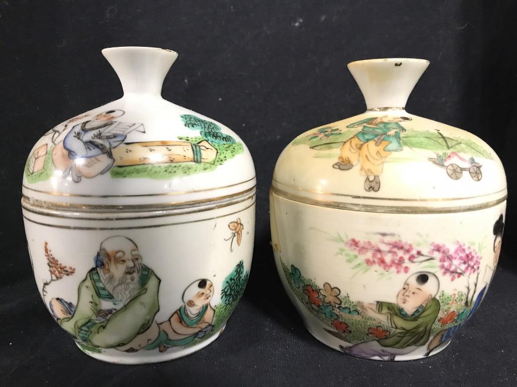 Lot 2 Vintage Asian Porcelain Vessels: Lot includes 2 porcelain vessels. Each have hand painted detail. Each measures 5 inches tall 4 inches wide. asian arts and crafts, ginger jars, kitchenware, kitchen accessories, shelf decor