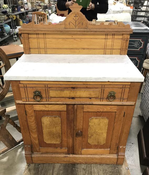 Marble Topped Eastlake Style Buffet Table: Vintage Possibly Antique Marble Topped Eastlake Style Buffet Table With Carved Design, burled wood mounted panels, and brass toned metal drawers pulls, some scratches, chips and nicks due to age and u