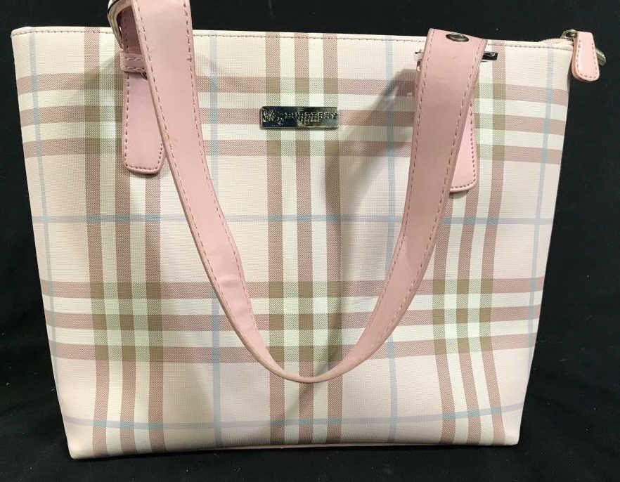 Burberry Signed Pink Plaid Purse: Emblem for Burberry, Possibly reproduction, pink fabric hand bag in plaid pattern pink leather straps, chrome harware, some wear to leather, bag to straps measures htv10 inches width app 14 inches lad