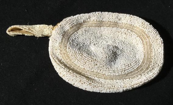 Vintage cream beaded coin purse: Possibly handmade. Some beads may be missing. Measures approx 6 inches wide. Zipper closure. Loop for holding/attaching keychain. Coin purse, pouch, purse, clutch, wallet, vintage, collectible, collec