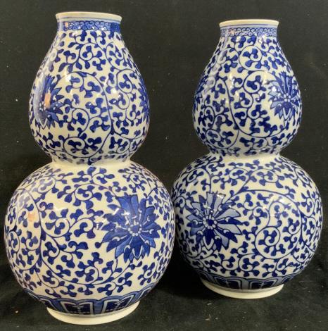 Pr Signed Blue White Asian Vases: Signed underside w Asian Characters, pair Blue and White Porcelain Gourd Form Vases, Vessels, Asian decorative arts, table ware, chinoiserie, each measures ht 9.5 inches diameter app 6 inches