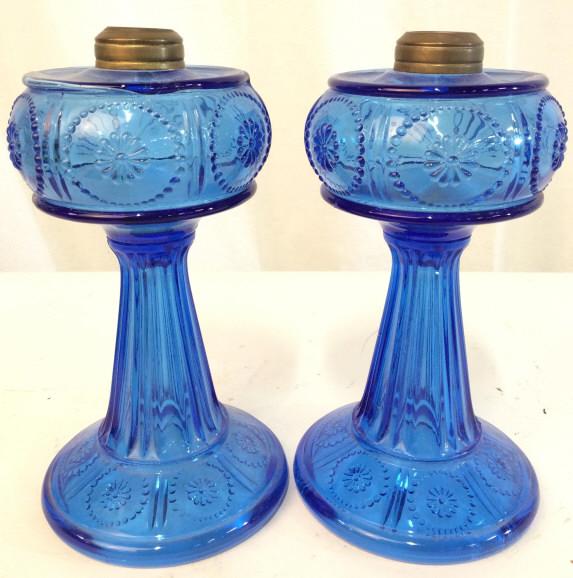 Pair Blue Toned Art Glass Candlesticks: Lot includes 2 Candlesticks. Each are blue toned. Each have beveled floral & dot detail. Each measures approx. 8 inches tall 4.5 inches wide. tableware, decorative arts and accessories, art glass, can