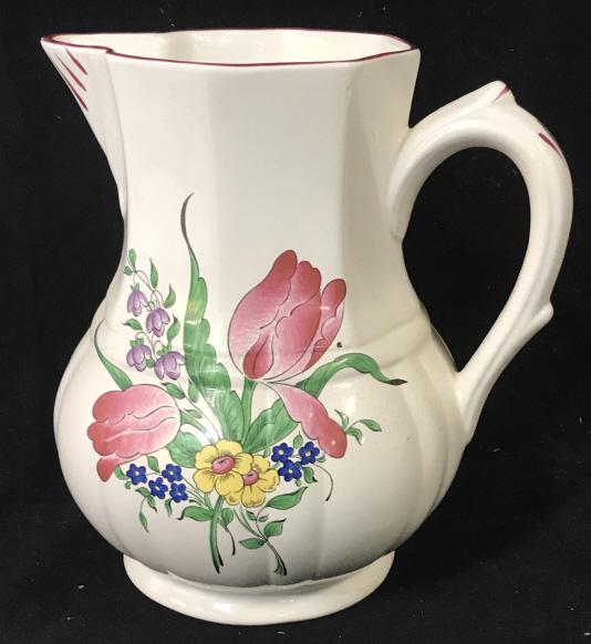 KG LUNEVILLE French Vintage Pitcher: KG LUNEVILLE France Earthenware dates back to the mid 1700s in Lorraine, France. Painted Tulips & other florals. Underside with Mark ‘ KG Luneville France’. App 8 in. height, 7 in width. No surfac