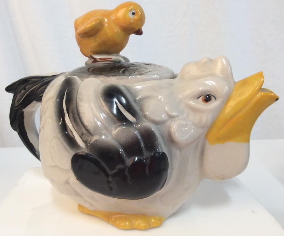 Vintage Chicken Teapot: Mother hen body and chick design lid, retro porcelain teapot in tones of black white and yellow, measures approx 6 1/2 in by 9 in b 6 in. Some minor chips and wear to glaze, Kitchenware, tableware, ta