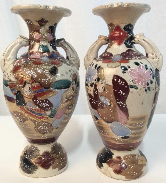 Pair Chinese Antique Painted Vases: Evident repair to both bases and one top, chips to handles, gold toned painted details, paint in tones of blues reds and Browns, signed on underside with asian characters. measures approximately 9 1/2