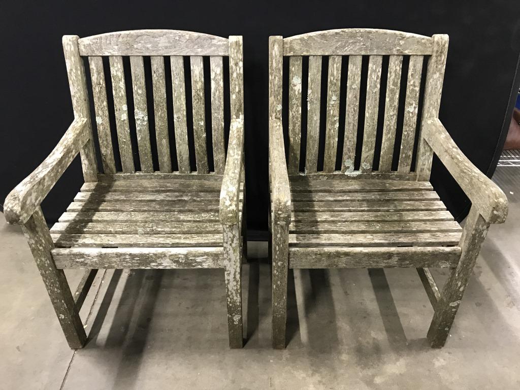 Lot 4 Smith & HAWKEN Outdoor Teak Wood Armchairs: Lot 4 outdoor teak wood armchairs, marked on backs for Smith & Hawken, each measures approx 36 inches in height by 23.5 inches in width by 18 inches in depth. Discoloration and weathered surface wear 