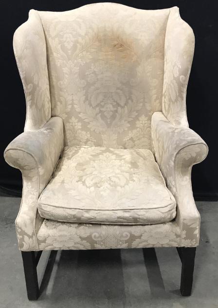 Vintage Wingback Upholstered Armchair: Vintage Wingback Upholstered Armchair, upholstery is worn and discolored, ink marks to underside of cushion and chair base under cushion, measures approximately 46 inches tall x 32 inches wide x 30 in