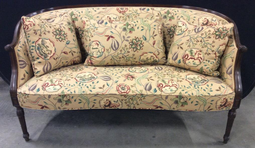 Vintage Floral Detailed Upholstered Setee Loveseat: Contains multi toned floral leaf and vine detail. Piece measures approx. 56 inches long 32 inches tall 26 inches deep. Contains carved wooden frame. Loveseat, sofa. home furnishings, home furniture, l