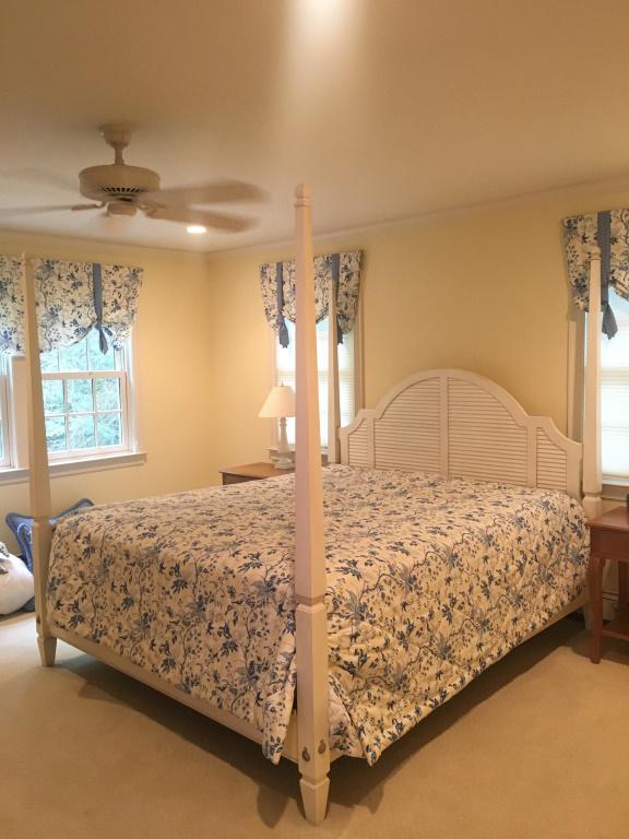 King Size Ethan Allen Four Poster Bed: King Size Ethan Allen Four Poster Bed Frame with slatted headboard and white painted finish, some minor nicks and scratches, measures approximately 84 inches tall x 77 inches wide. Master Bedroom Furn