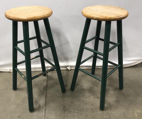Pair Vintage Painted Wooden Bar Stools: Pair Vintage Painted Wooden Bar Stools With green toned painted legs, marked on underside in wood GB Aug 24 1992, measures approximately 29.5 inches tall x 13 inches in diameter, marks to seat and chi