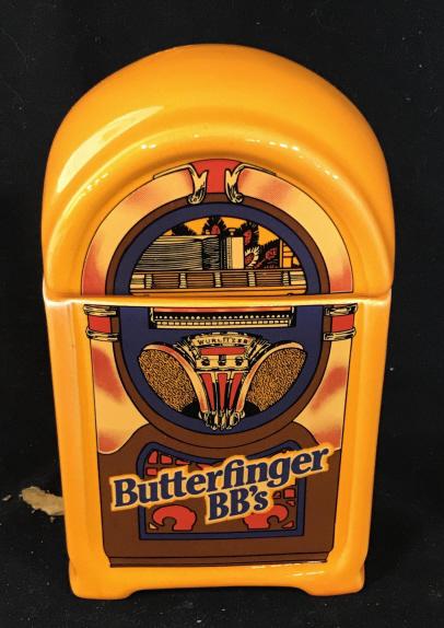 Lid Top Butterfinger Jar, Ceramic: Bright orange color, Juke Box Butterfinger Design on front, 7 x 3.5 in. Removable lid. Ceramics, Jars, Butterfinger Candy, Candy Jar, Cookie Jar, Kitchen Item, HomeGoods, Pottery, Tabletop, Small Stor