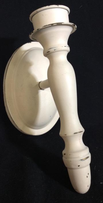 Vintage metal mounted candle holder: Wall mounted candle holder made from metal. Metal is painted over with matte cream toned paint. Measures approximately 9 inches long. Candle holder, candle, lighting, mounted lighting, mounted candle 