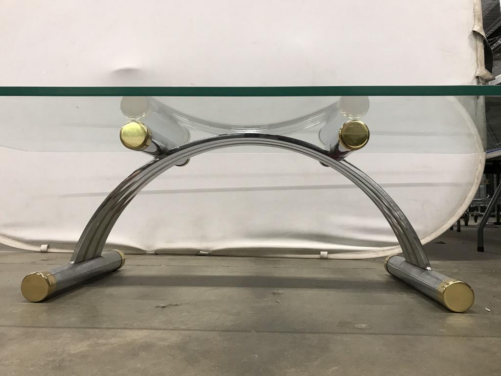 Vintage Deco Style Tubular Metal And Glass Table: Vintage Art Deco Style Tubular Metal And Glass Low Table with inverted half moon shaped tubular silver and gold tone metal base and rectangular glass top, glass measures approx 60 inches long x 30 inc