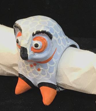 Animal Figurine Napkin Rings, set 10: Matching pairs of animals- owl, chicken, peacock, turtle & hyena. Natural carved wood, painted wood or composite. Avg size, 4 x 3 in. Some have sticker that read Made in India. A few with cracked pain