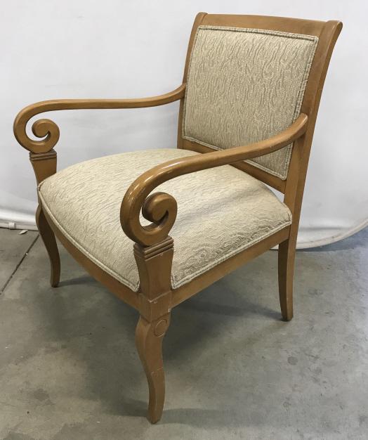 Ethan Allen Carved Upholstered Armchair: Ethan Allen Carved Upholstered Armchair with scrolled arms and upholstered seat and back with double welted trim, marked on underside with Ethan Allen Label, a few scratches and nicks to wooden frame,
