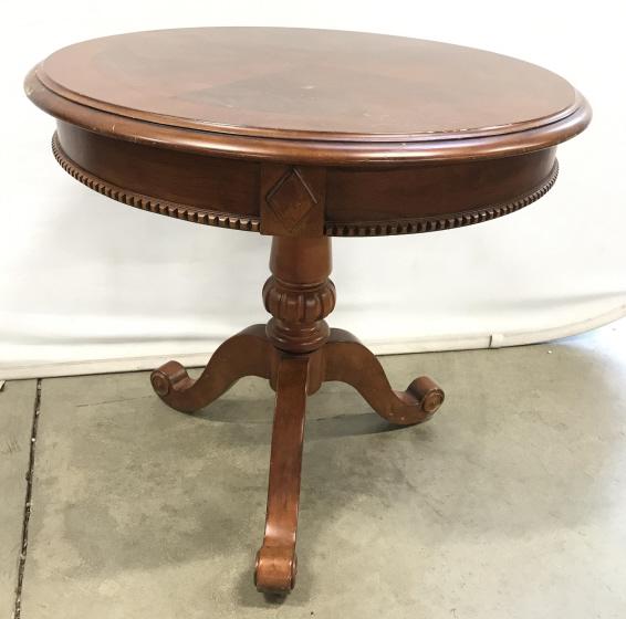 Circular Carved Mahogany Toned Pedestal Table: Circular Carved Mahogany Toned Pedestal Table with tripod scroll feet, some scratches and nicks, measures approximately 25.5 inches tall x 27 inches in diameter. Side Table, End Table, Round Table, Pe