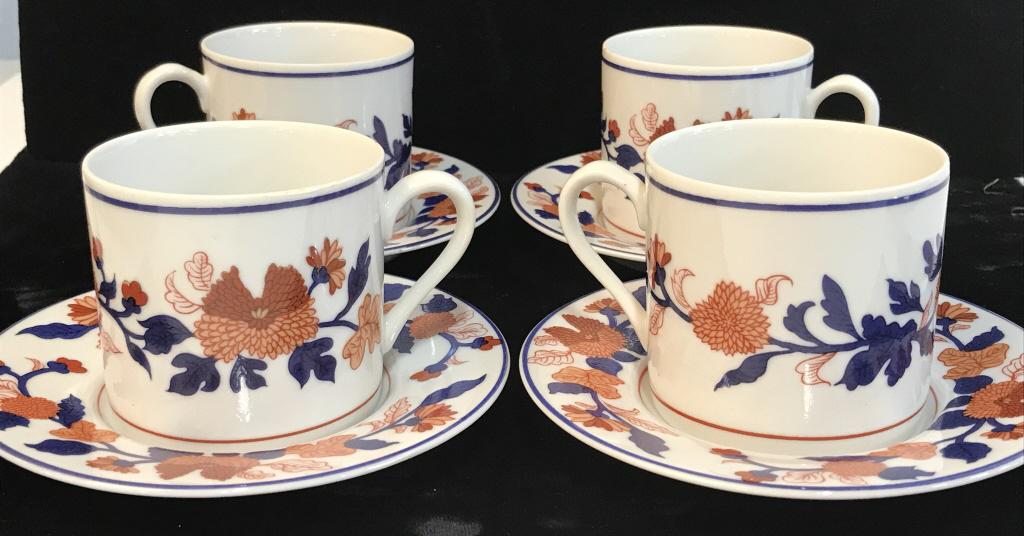 Fitz & Floyd Mandarin Garden Demitasse and Saucers: Set 4 Asian style demitasse cups and matching saucers in Mandarin Garden pattern by Fitz and Floyd. Beautiful flower and vine patterns, gorgeous navy and red colors. Plate 4 3/4 in diameter. Cup 2 1/4