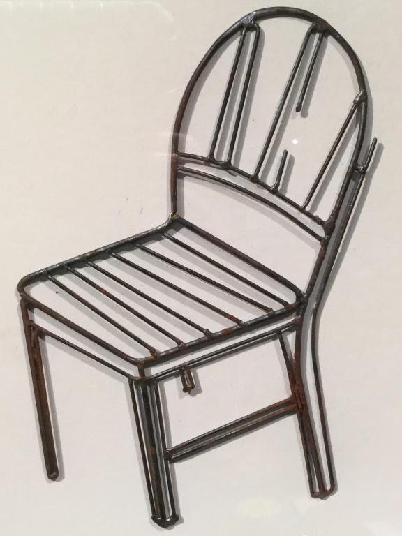 Signed & Numbered PURCELL Mixed Media Diptych: Signed Purcell in pencil in lower right corner of pressed print, for Charles Roy Purcell. Pressed print is numbered 5/125 and titled ‘Chair.’ Metal chair for stamp is mounted to the side as a dipt