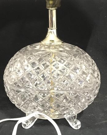 Pair Footed Diamond Pattern Glass Lamps: Egg shaped cut glass center with Diamond pattern. 4 scroll feet. Silver tone stem. Lamps come with white fabric, cut corner e,Evans shape. Brushed nickel ball finials. App 18 in. tall by 8 in. wide (