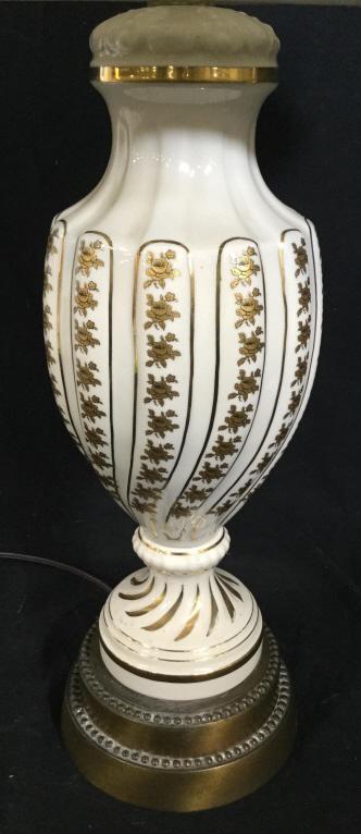 Cream & Gold Toned Porcelain Lamp W Shade: Lamp is cream toned with black & gold toned floral detail. Vase is gold toned Possibly brass. Piece includes shade. Measures approx 28 inches tall 6 inches wide. home lighting and accessories table la