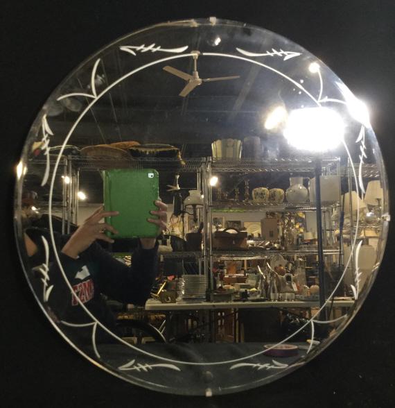 Beveled Circular Beveled Wall Mirror: Wall mirror is circular and beveled. Piece has frosted detail near edges. Piece measures approx 24 inches wide. Wall mirror, mirror, circular mirror. home decor, wall hanging home accent hall mirror 6