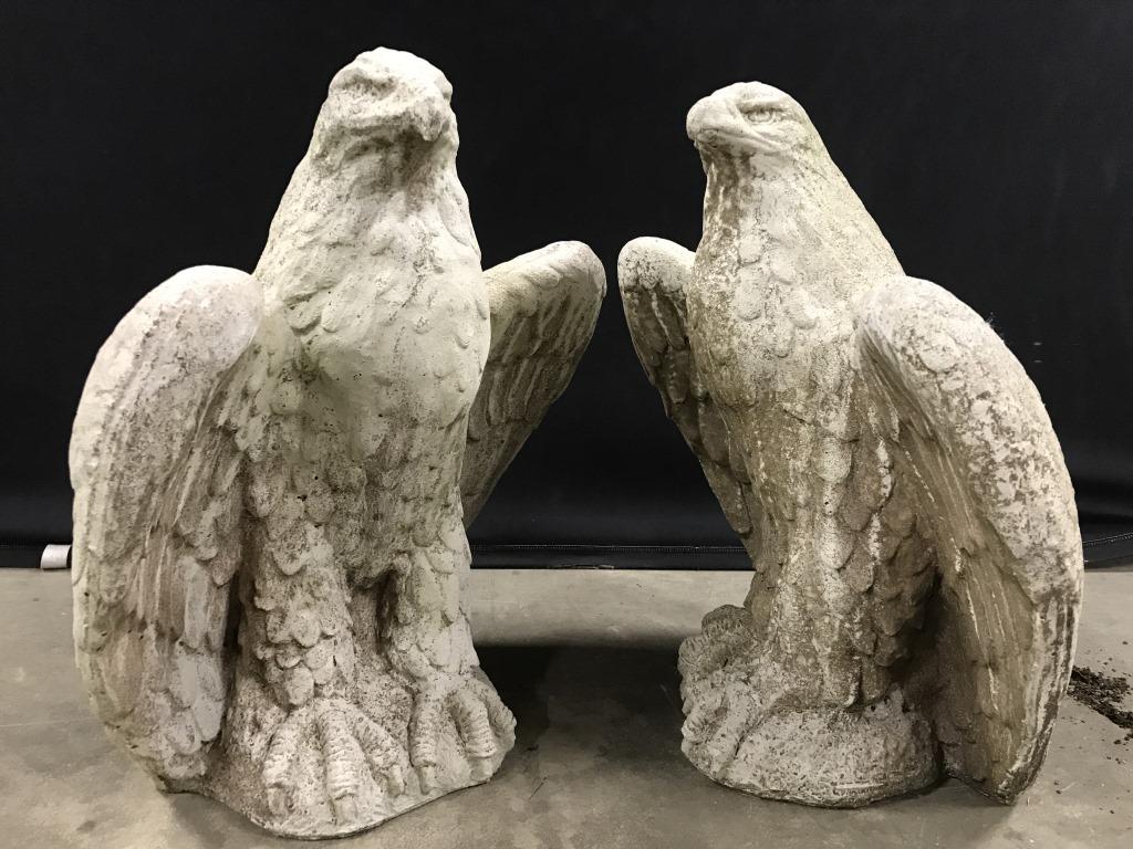 Pair Cast Stone Sentinel Eagle Statues: Pair of vintage, possibly antique, cast stone sentinel Eagle, hawk statues. Each measures approx 20 inches in height by 17 inches in width by 12 inches in depth. Discolorations and surface consistent 